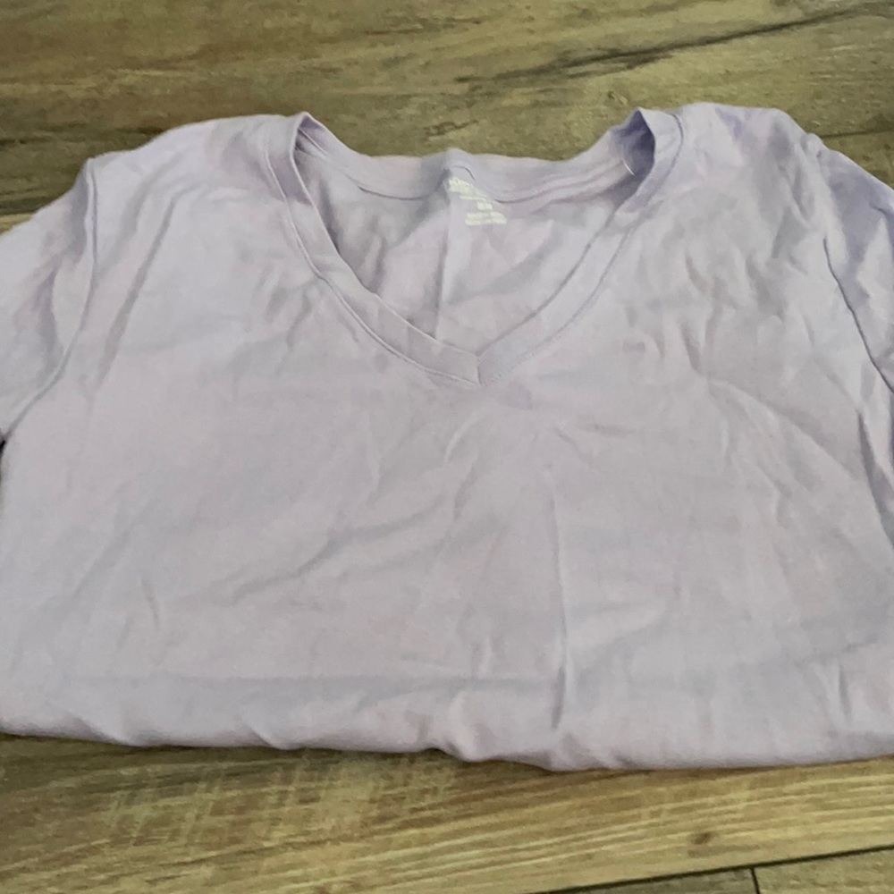 From Kirkland. Short sleeve shirt. Purple